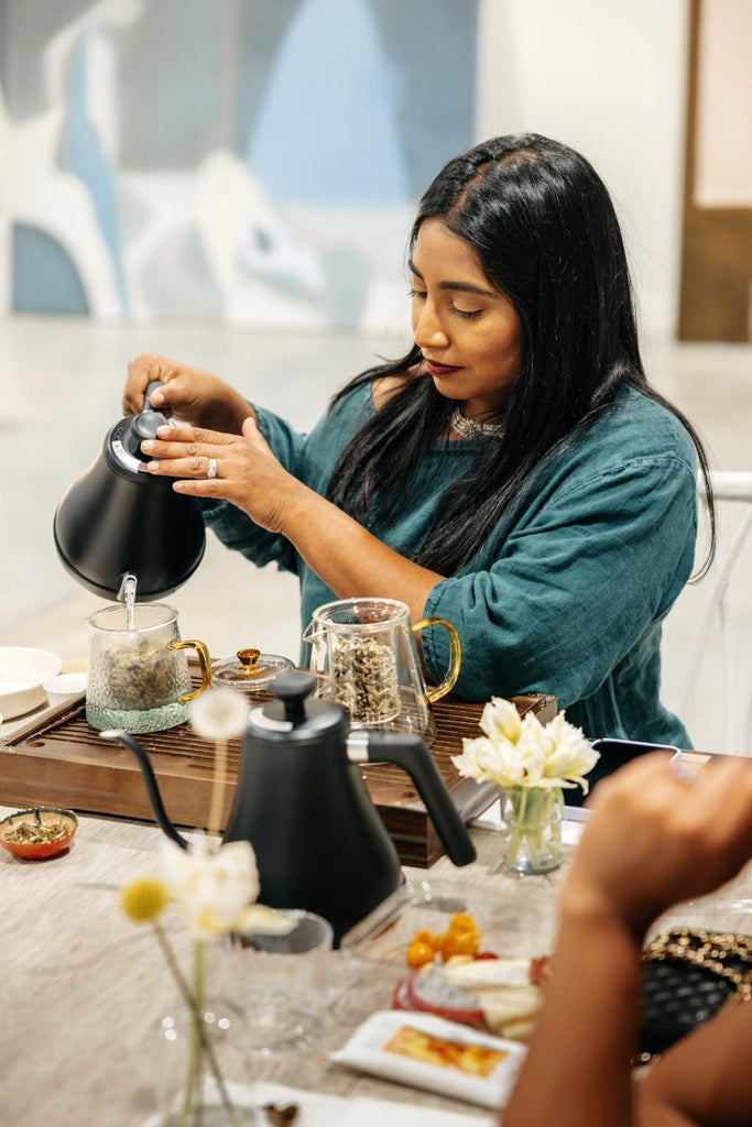 Poorvi making Lavish Blue Tea at an event